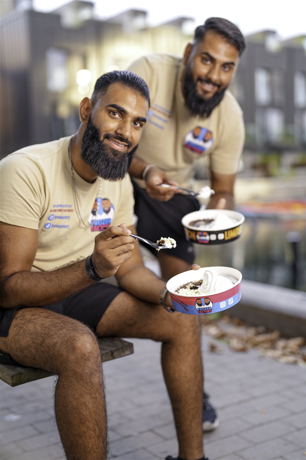 The Frozen Factory founders enjoying their desserts by the canal