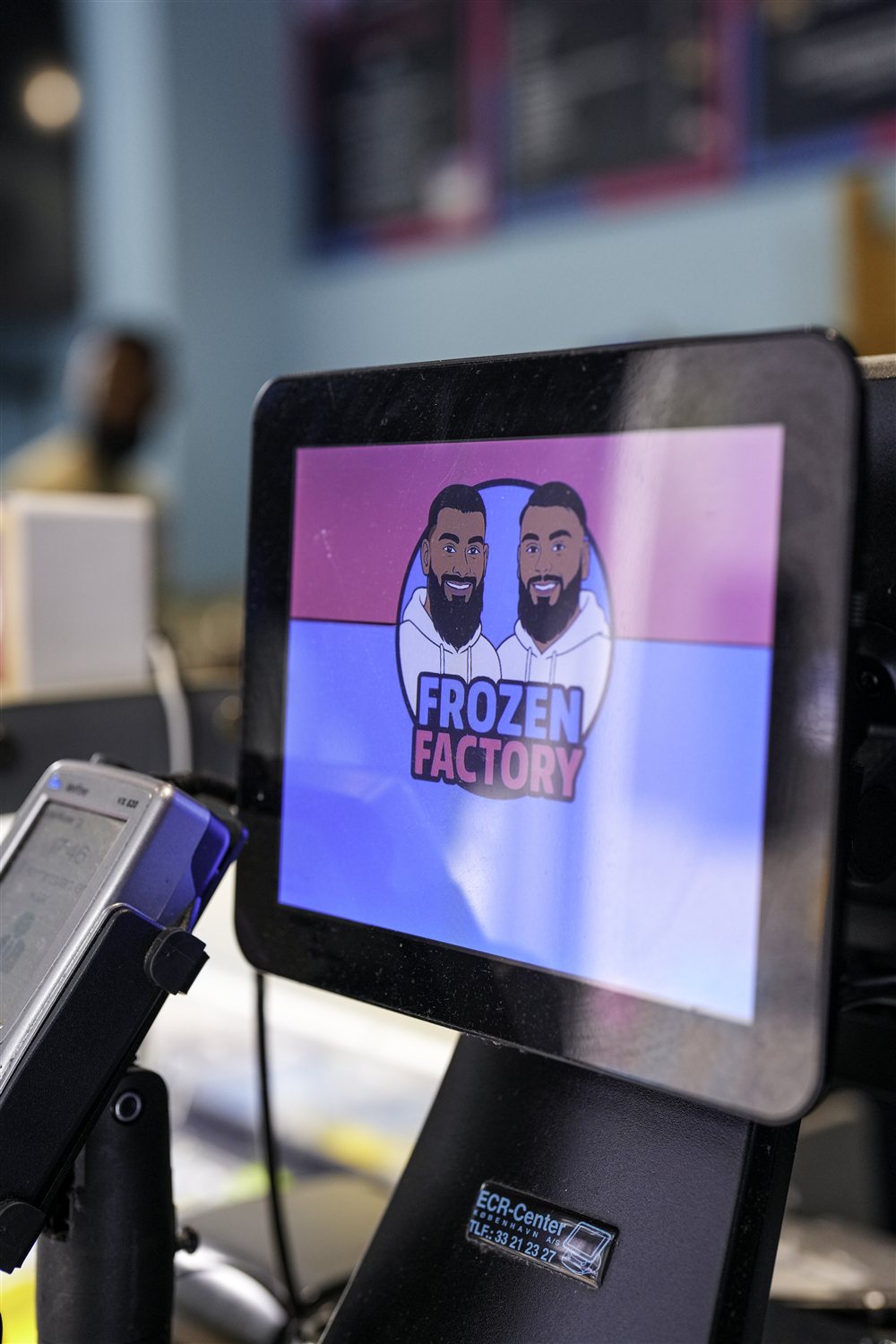 The Frozen Factory logo on the in-store till screen